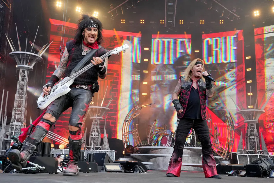 Mötley Crüe performing live on stage
